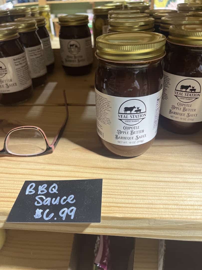 Jars of homemade apple butter and barbecue sauce at Veal Station Amish Market