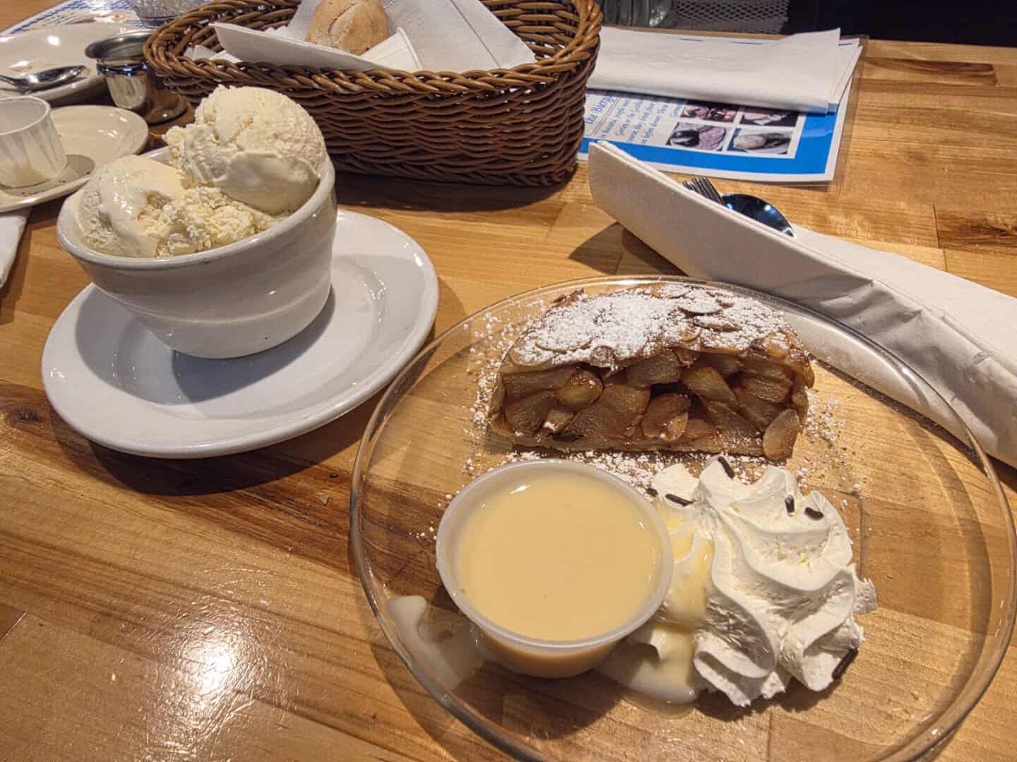 German apple strudel dessert with ice cream at Bavarian Grill in Plano