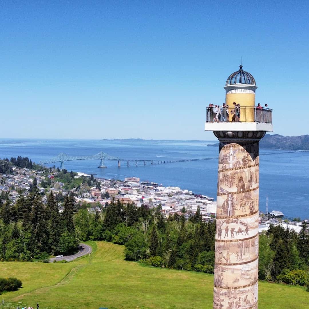 The Astoria Column above the town, riverfront, and Astoria-Megler Bridge in Astoria, Oregon