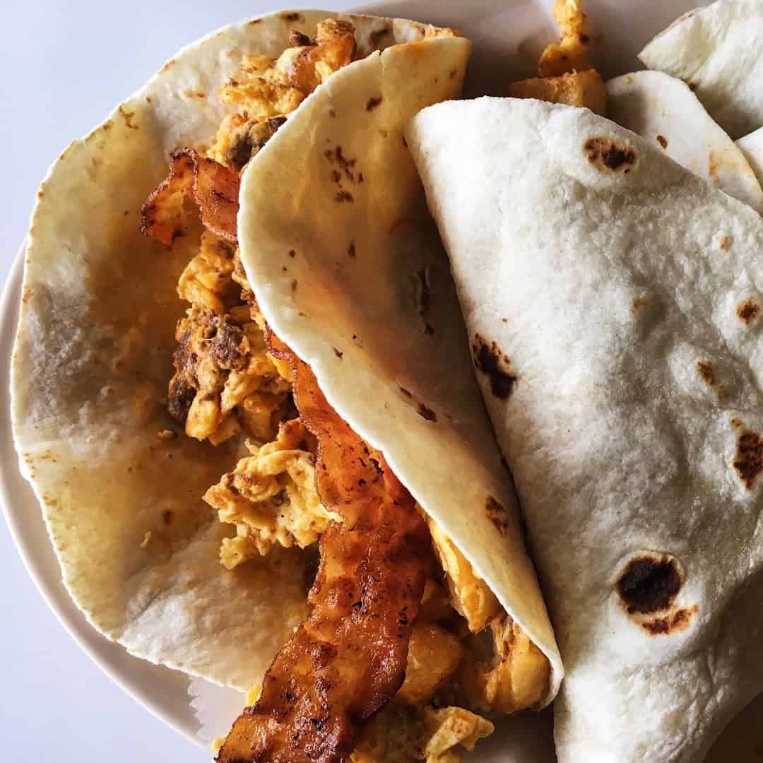 Bacon and egg breakfast tacos on homemade flour tortillas at Southside Barbacoa in Corpus Christi