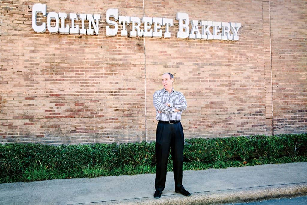 The Collin Street Bakery sign on its brick building in Corsicana, Texas