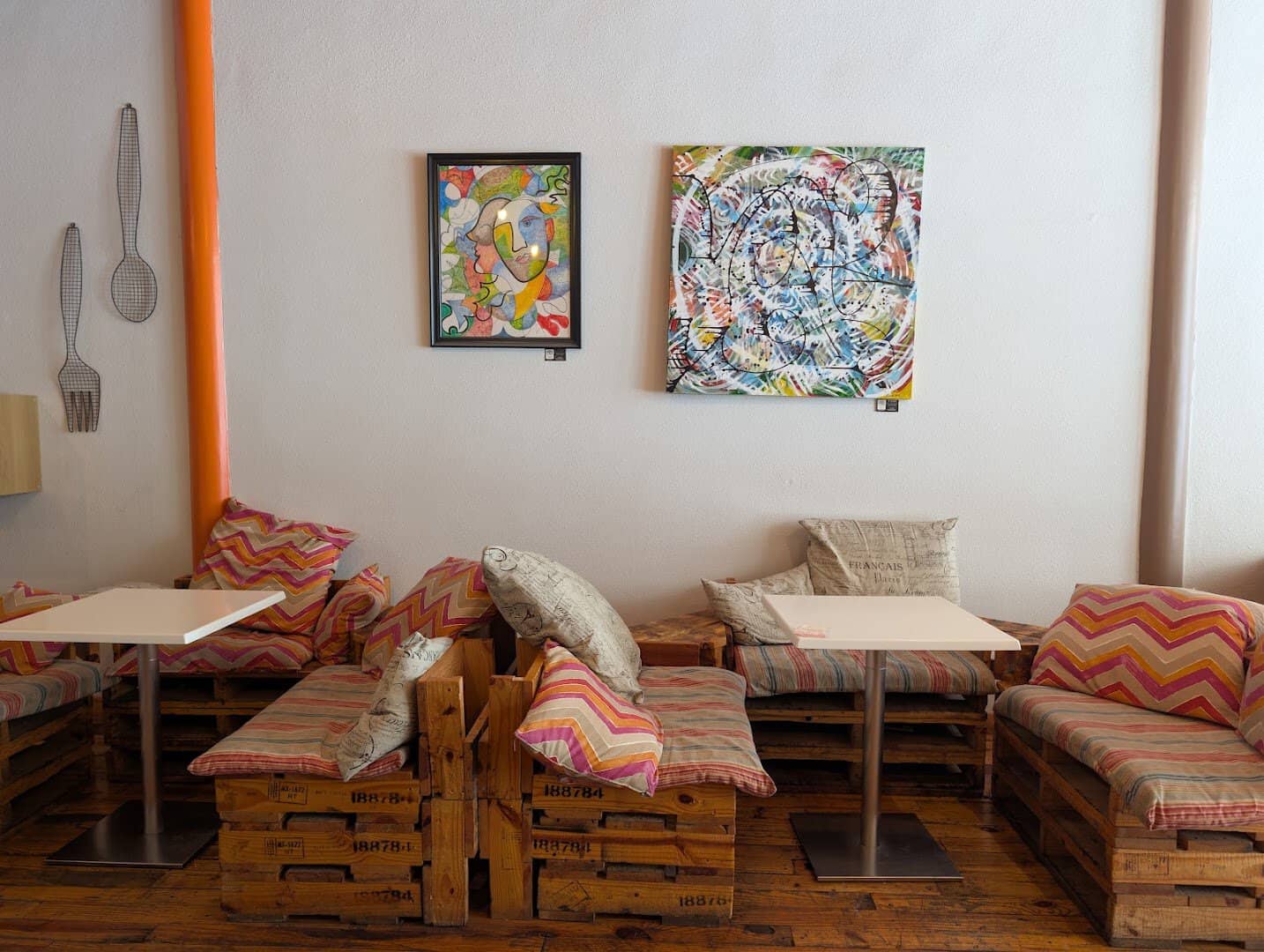 Cozy cafe seating area inside La Boulangerie in San Antonio