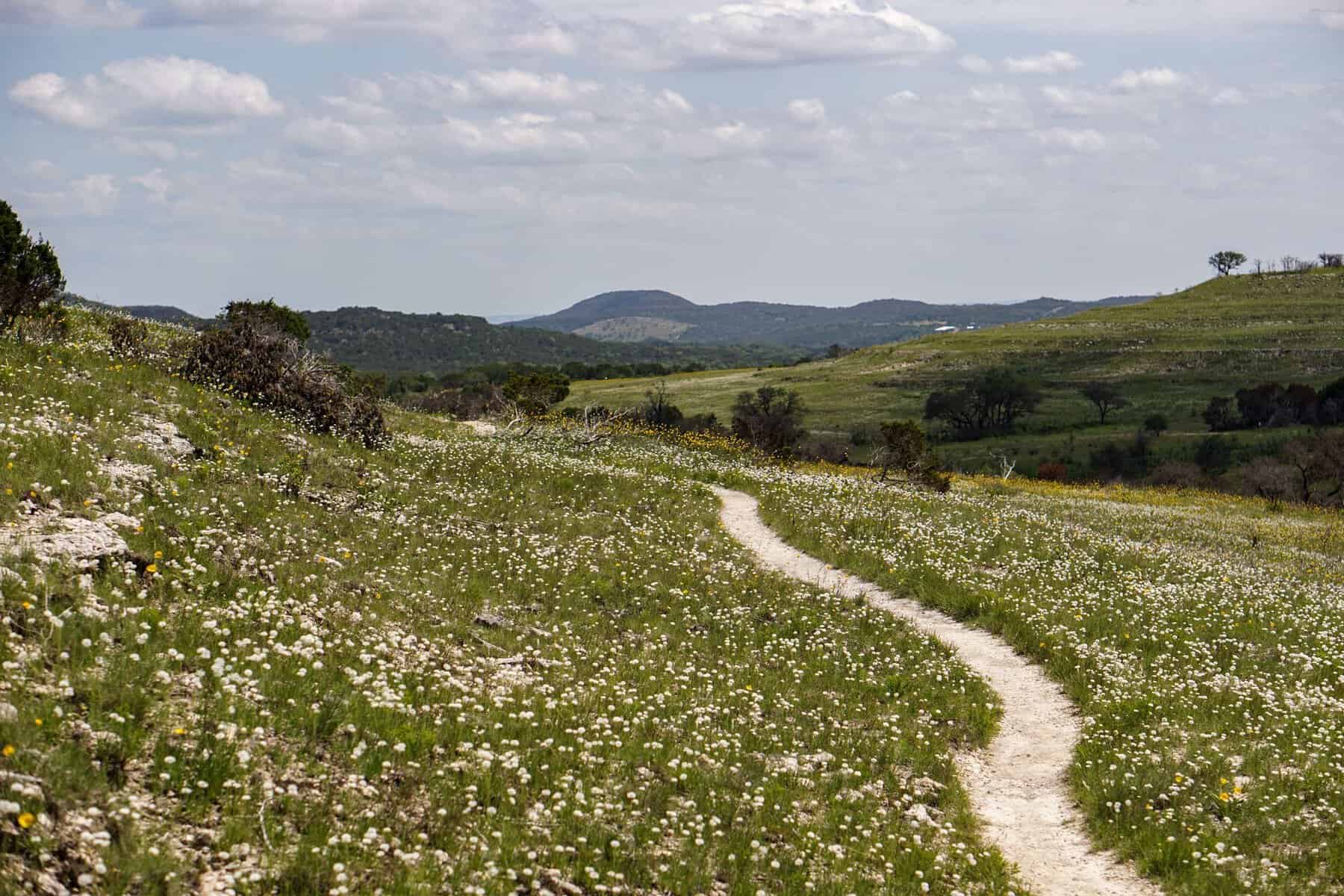 Trail winding through open Hill Country at Balcones Canyonlands National Wildlife Refuge