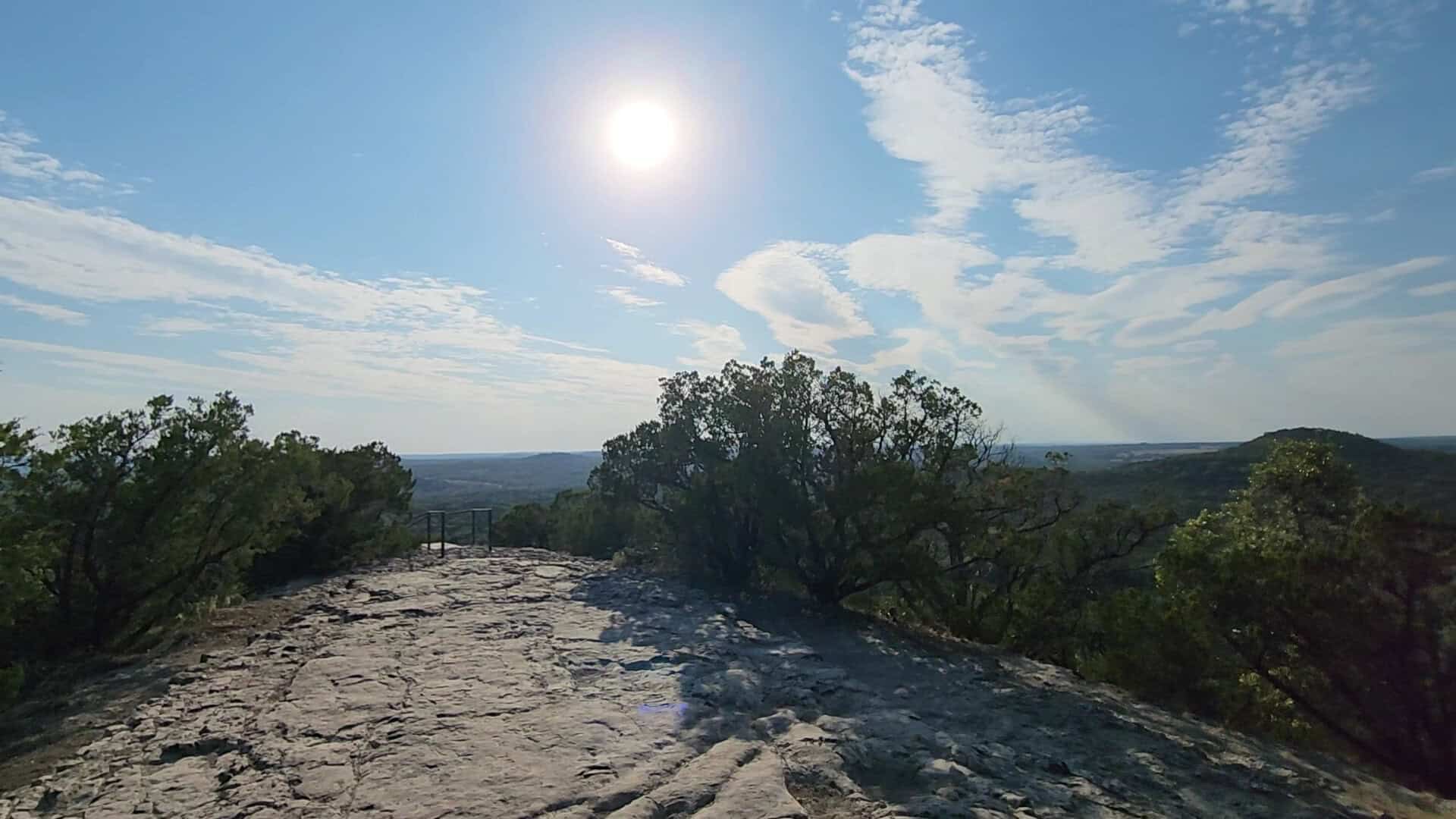 The bare limestone summit of Old Baldy under a wide Texas sky