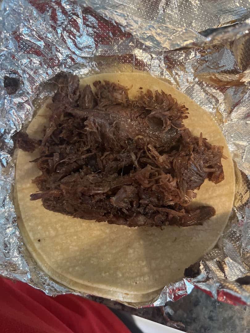 Shredded beef barbacoa taco on a corn tortilla at Southside Barbacoa in Corpus Christi