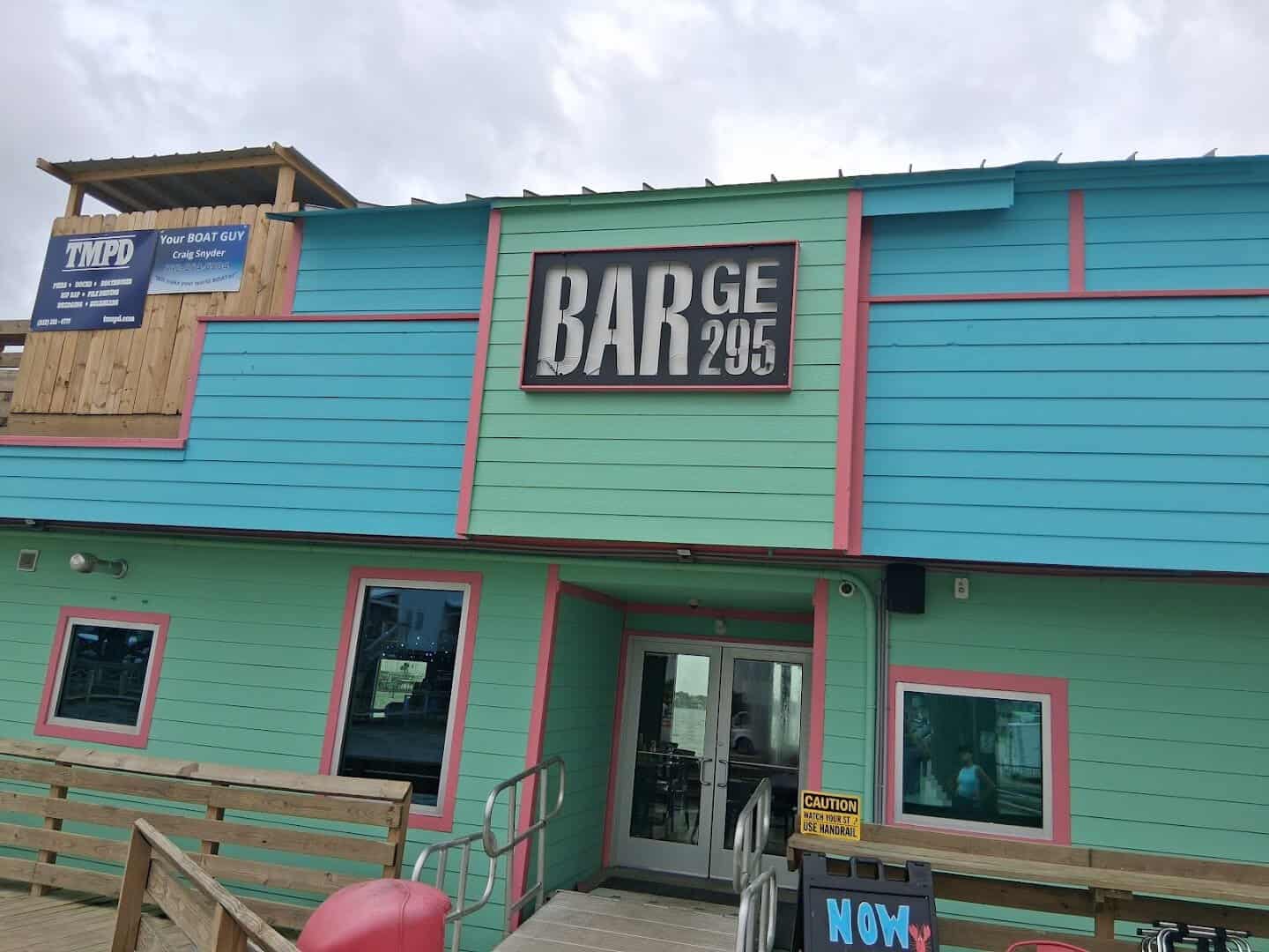 The BAR 295 sign on the front of the floating bar in Seabrook, Texas