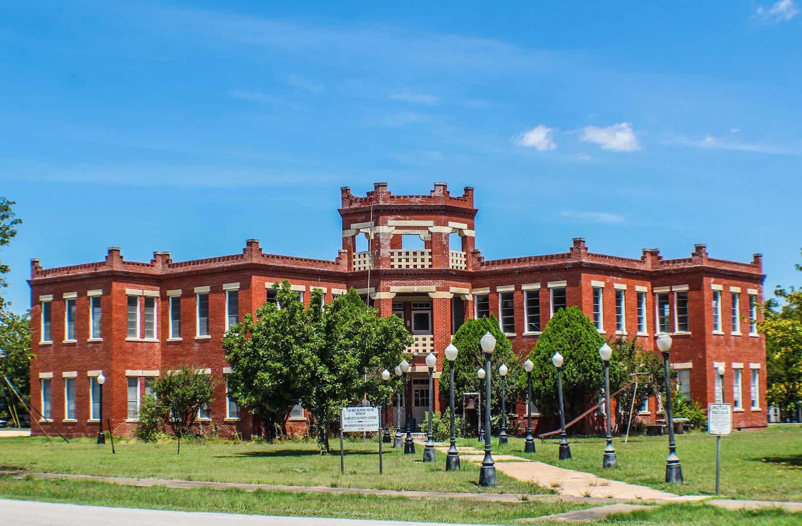 Historic red brick school building in Bartlett Texas