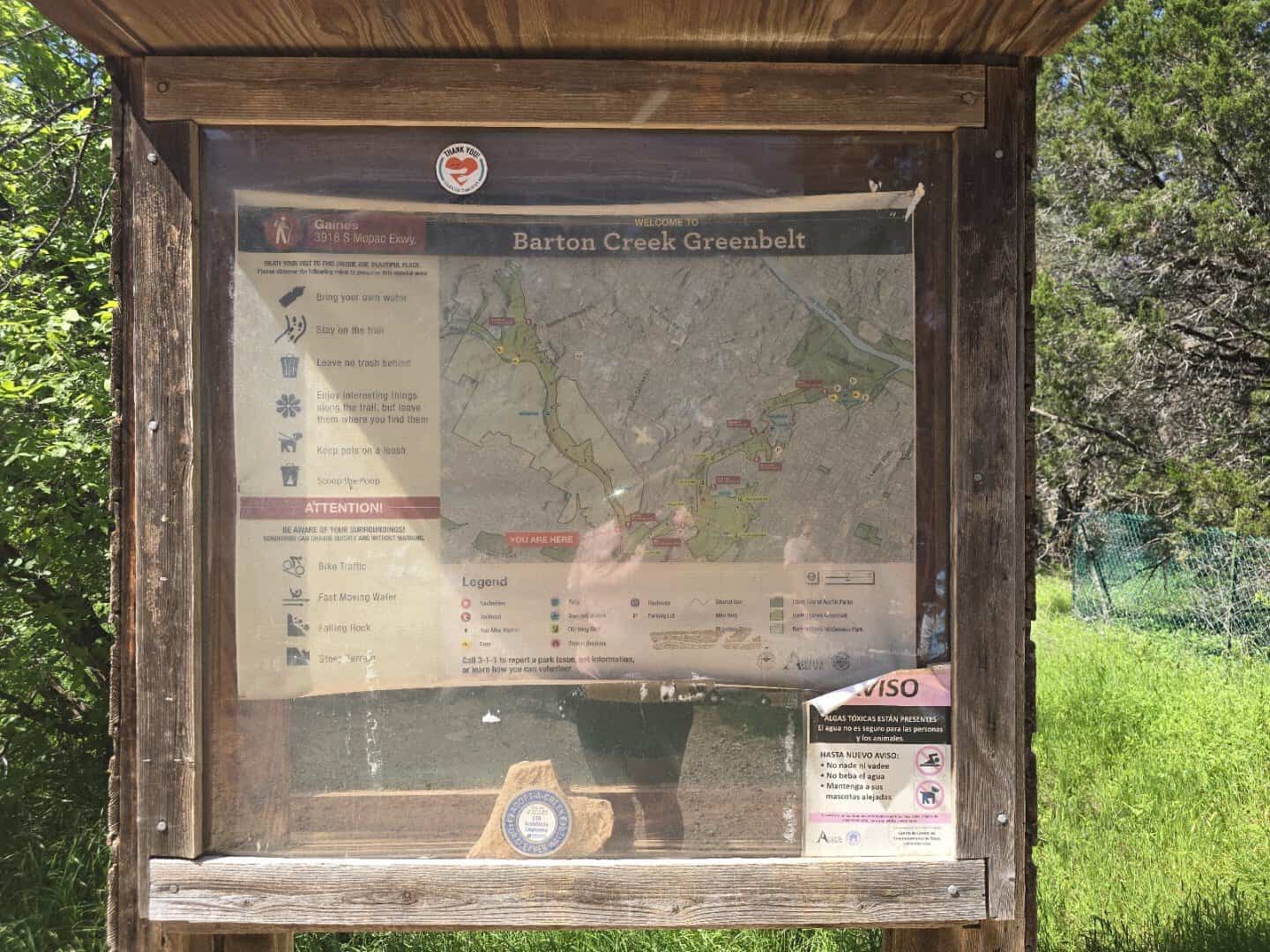 Trailhead map sign for the Barton Creek Greenbelt in Austin