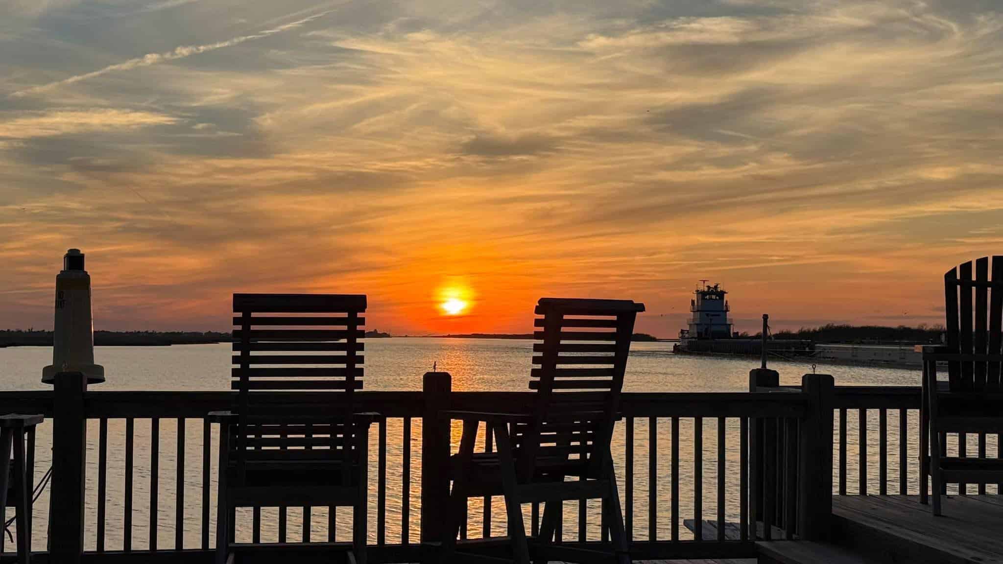 Sunset over the bay from the deck at Stingaree Restaurant in Crystal Beach