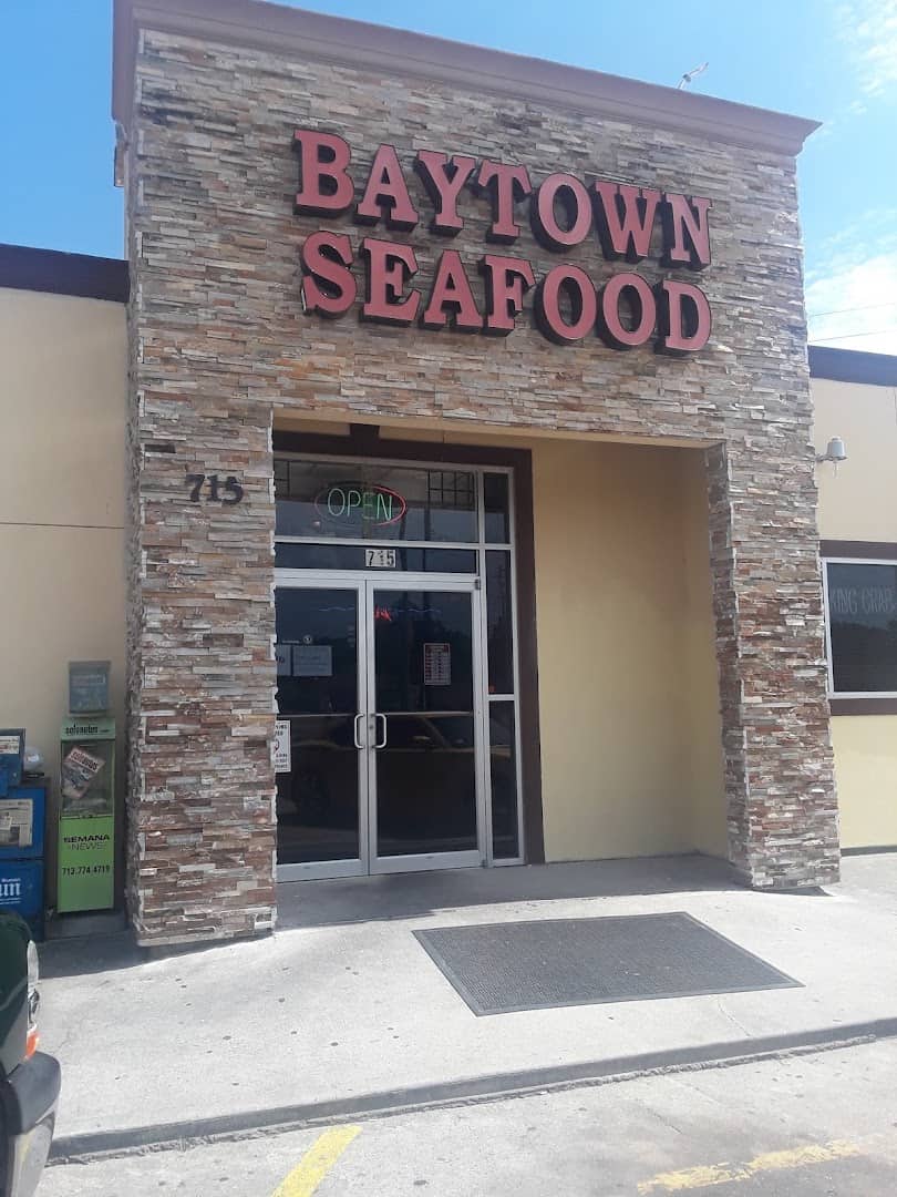 Storefront sign at Baytown Seafood in Baytown, Texas