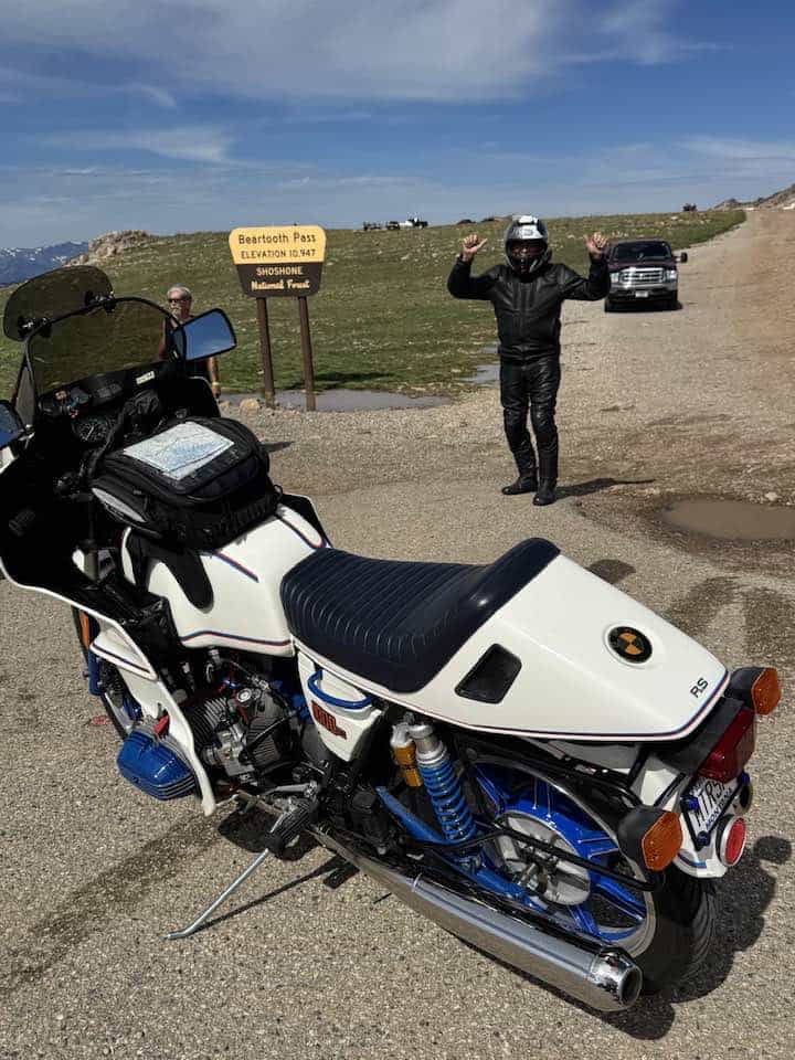 A motorcycle parked at the alpine summit of Beartooth Pass on the Beartooth Highway near Red Lodge, Montana