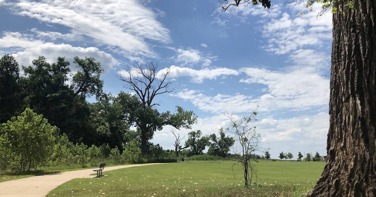 This Beginner-Friendly Texas Bike Trail Rolls Along a Scenic River Path
