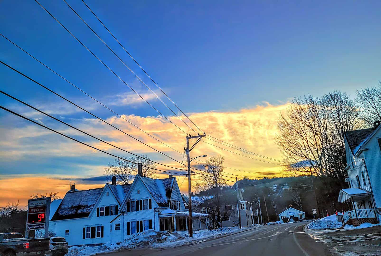 Historic white buildings along Main Street in the village of Bethel, Maine