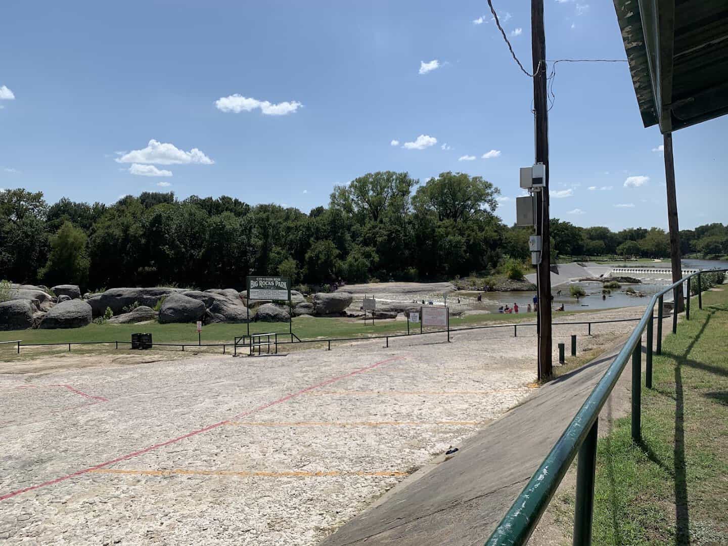 The grassy grounds and pavilion at Big Rocks Park in Glen Rose, Texas