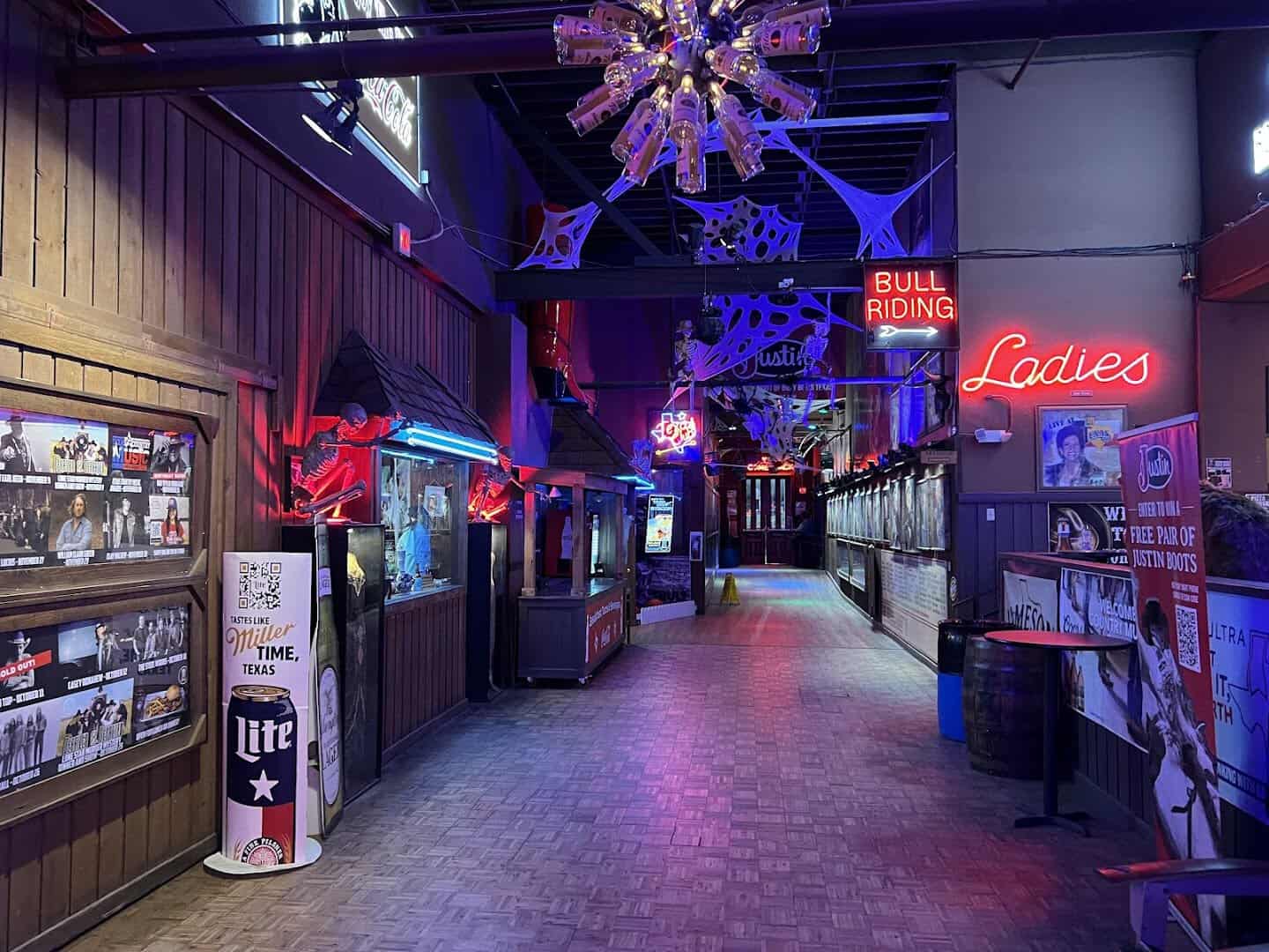 The large dance floor and neon Texas star at Billy Bob's Texas in Fort Worth