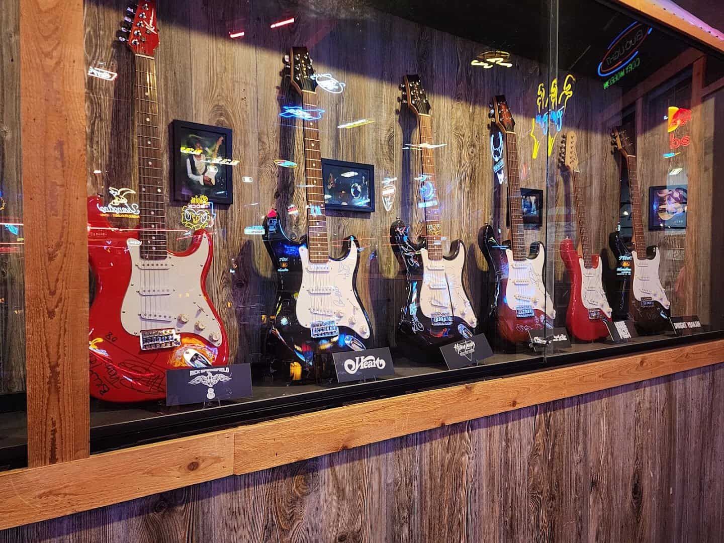 Autographed guitars from country stars on display at Billy Bob's Texas in Fort Worth