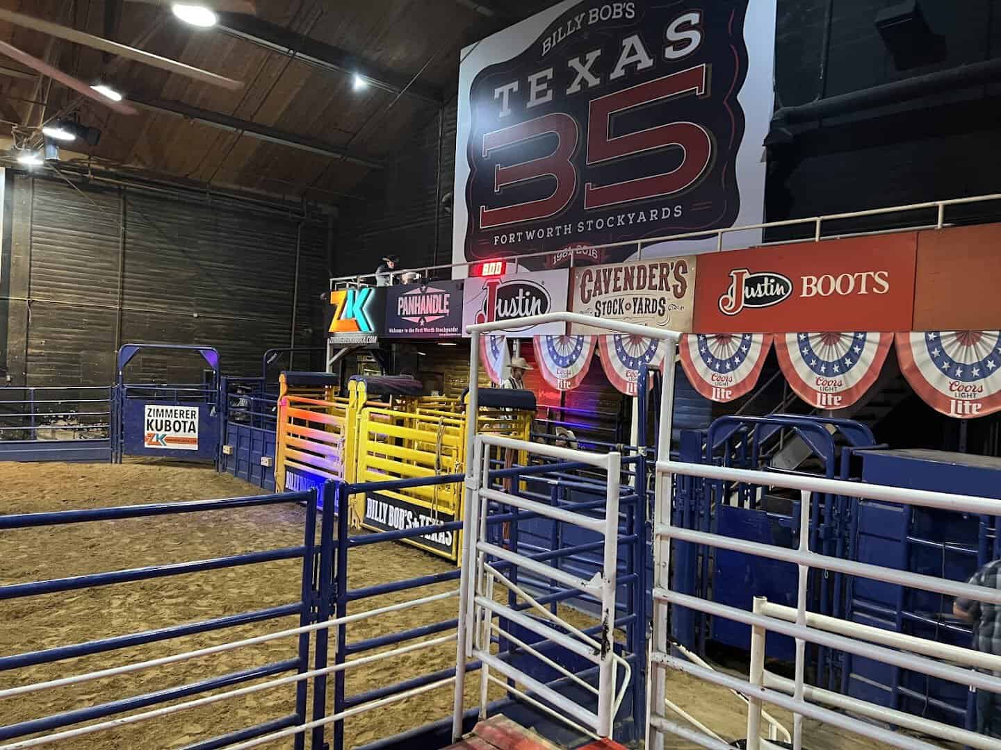 Neon signs glowing inside Billy Bob's Texas honky-tonk in Fort Worth