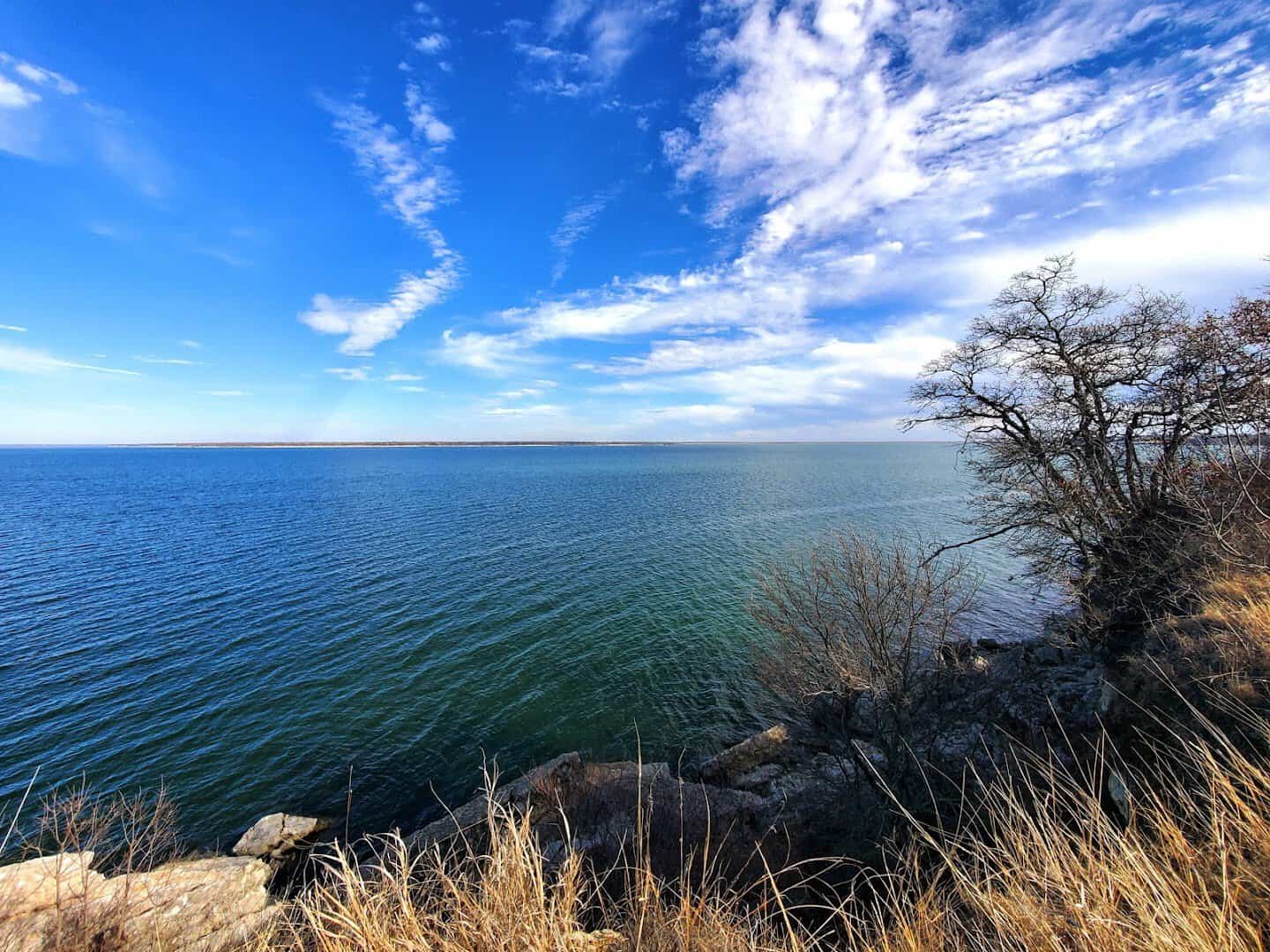Bright blue Lake Texoma seen from a bluff at Eisenhower State Park