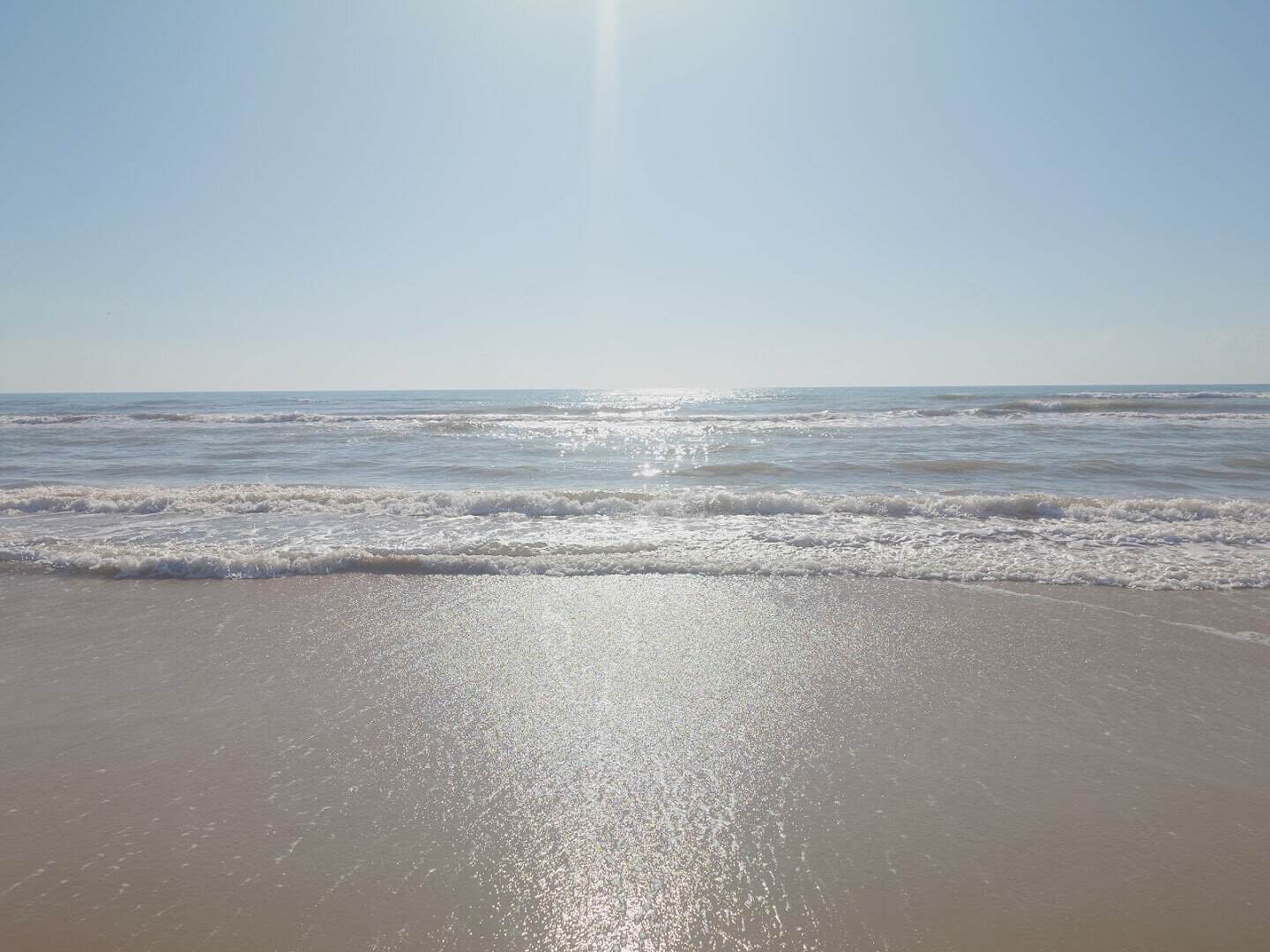 Morning sun on the surf at Boca Chica Beach, Texas