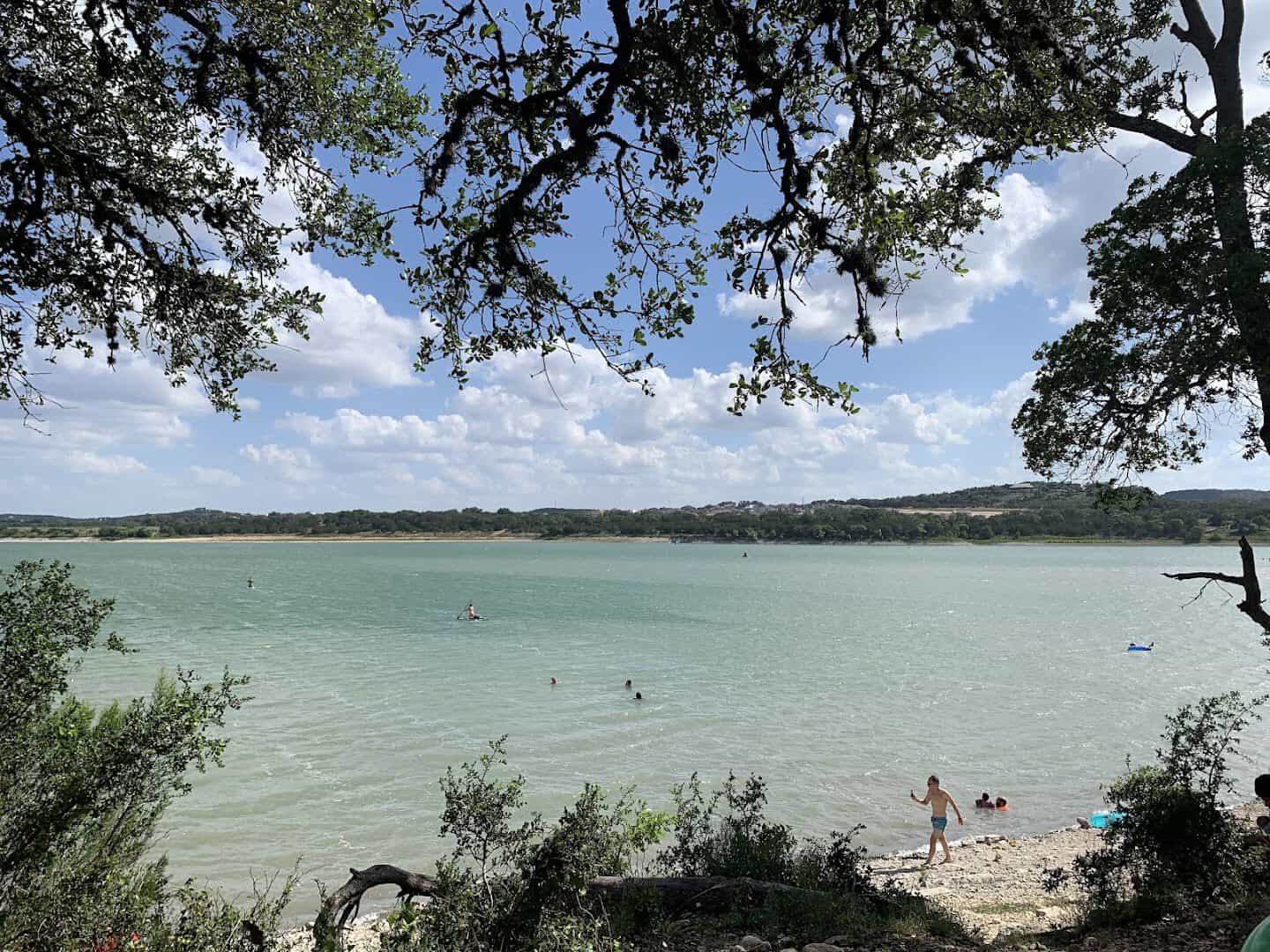 Broad turquoise cove and open shoreline at Boerne City Lake Park, Boerne, Texas