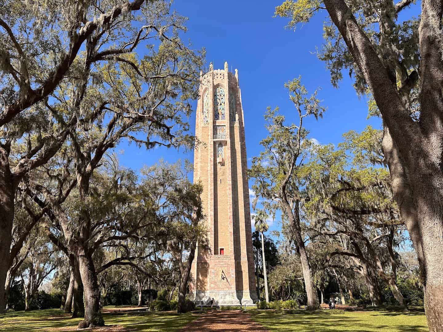The marble Singing Tower framed by oaks at Bok Tower Gardens, Lake Wales, Florida