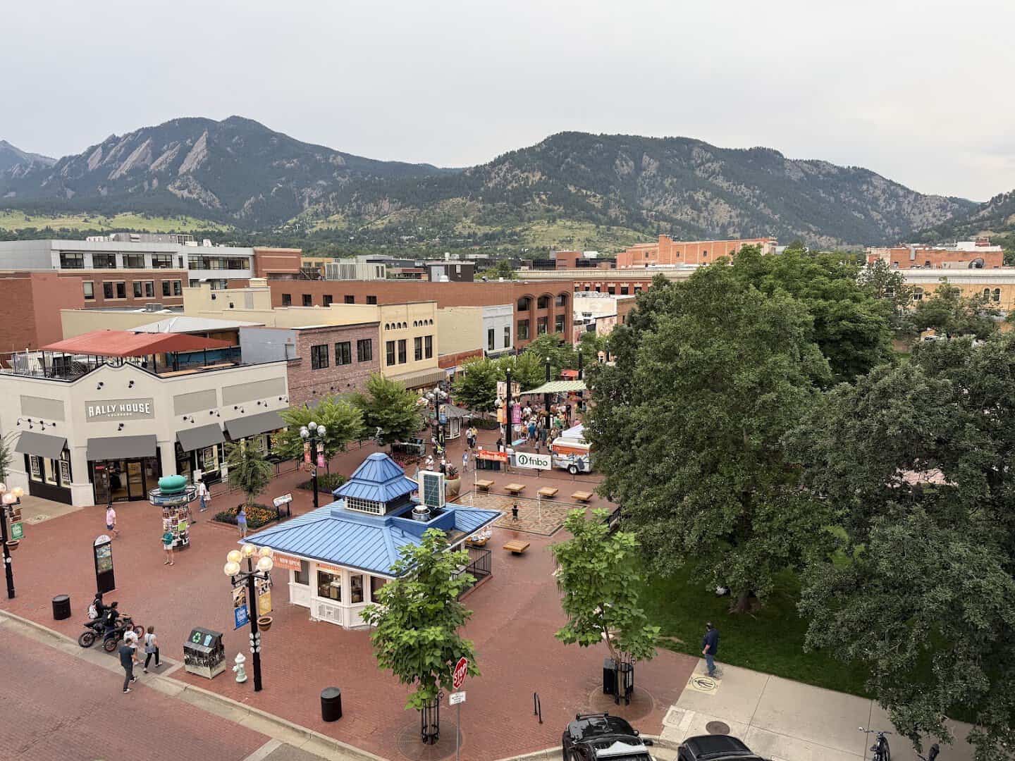 Downtown Boulder Pearl Street Mall with the Flatirons behind, Colorado