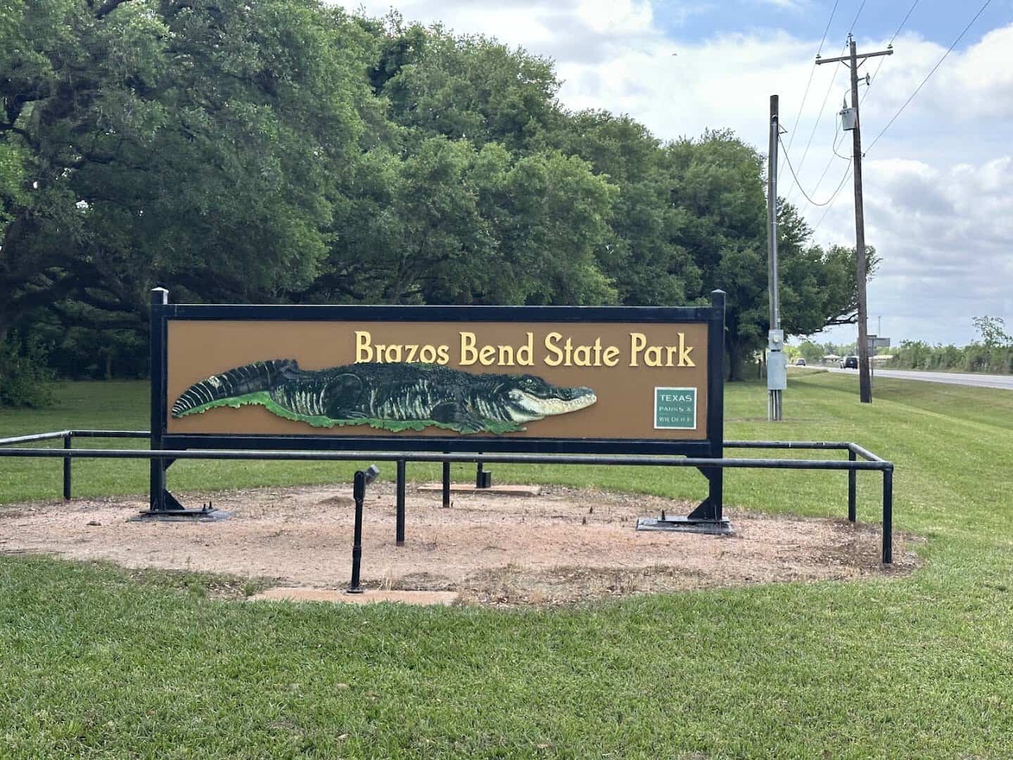 Entrance sign for Brazos Bend State Park near Needville, Texas