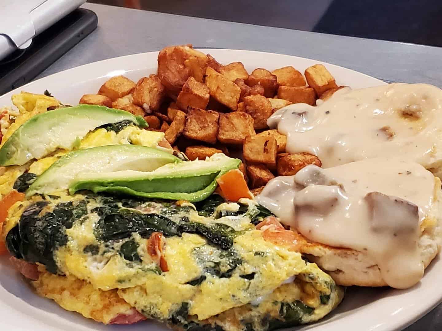 Breakfast omelet with avocado, potatoes and gravy at Rathskeller Bistro in Fredericksburg