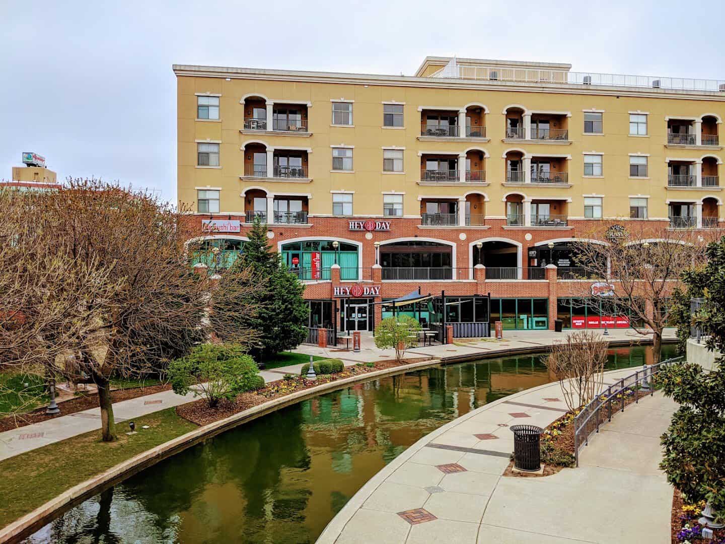 Brick buildings and restaurant patios along the Bricktown Canal in Oklahoma City