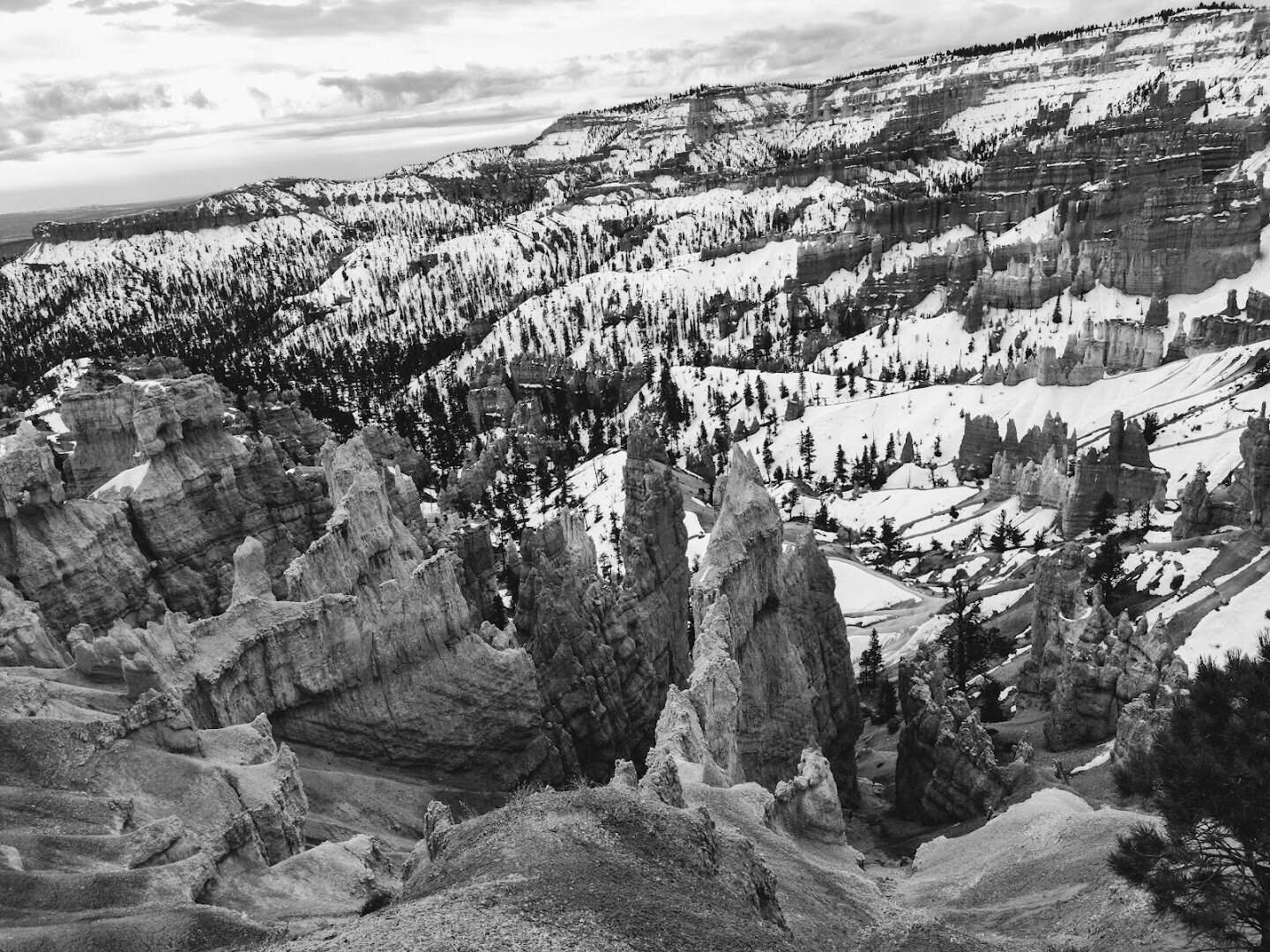 Snow blankets the hoodoo amphitheater at Bryce Canyon National Park, Utah, in winter
