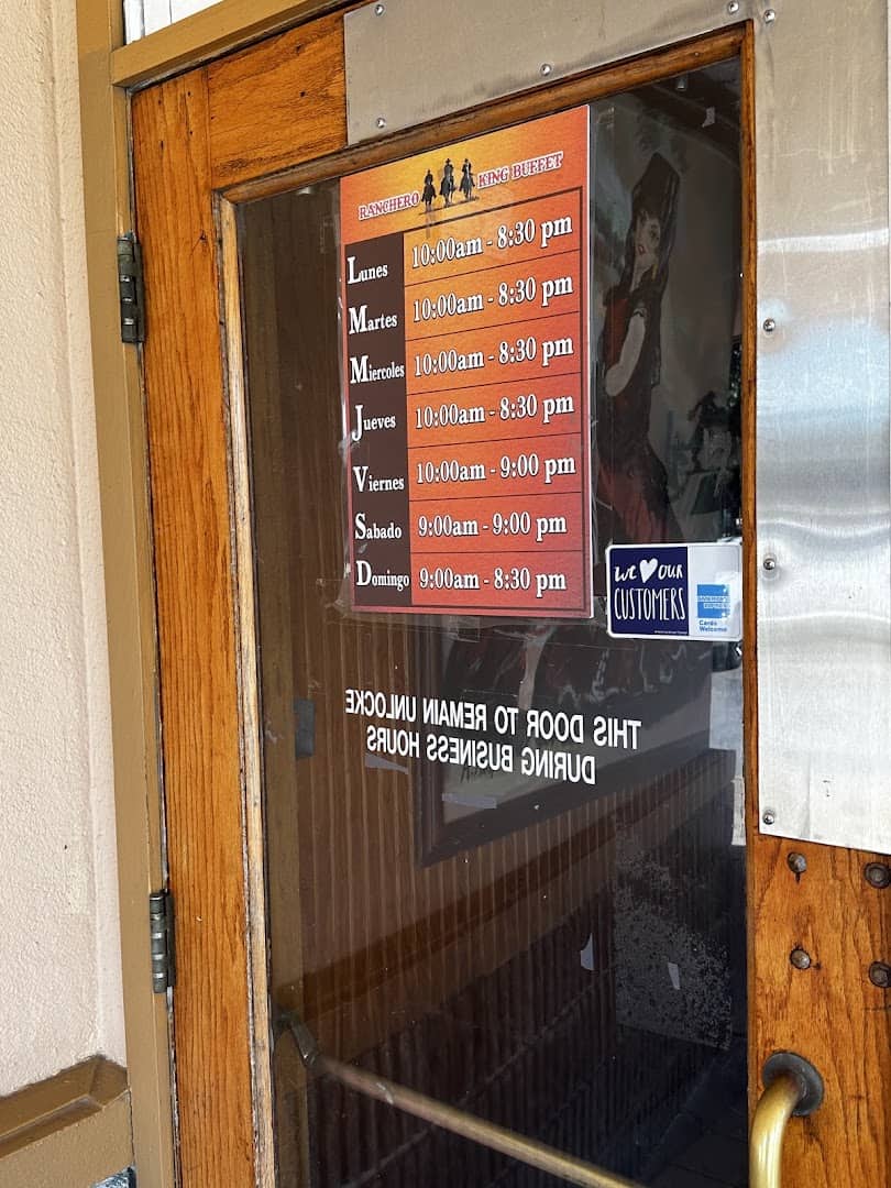Buffet pricing and hours board at Ranchero King Buffet in Houston