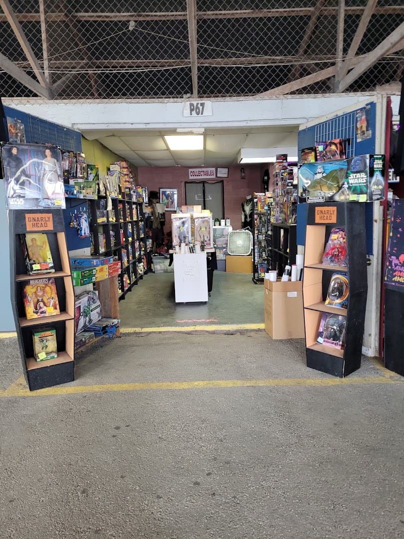 Vendor booth aisle stocked with goods at Bussey's Flea Market in Schertz, Texas