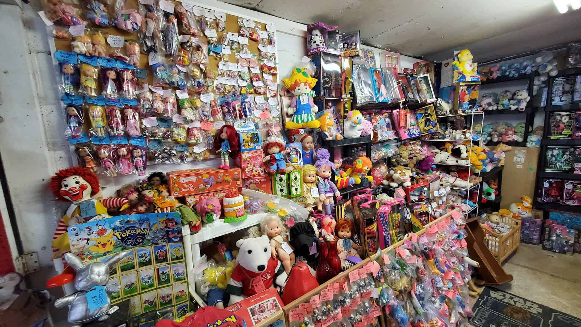 Booth packed with collectibles and goods at Bussey's Flea Market in Schertz, Texas