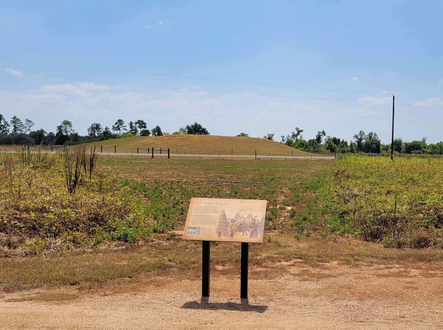 Crushed granite mound trail and interpretive marker leading to a mound at Caddo Mounds