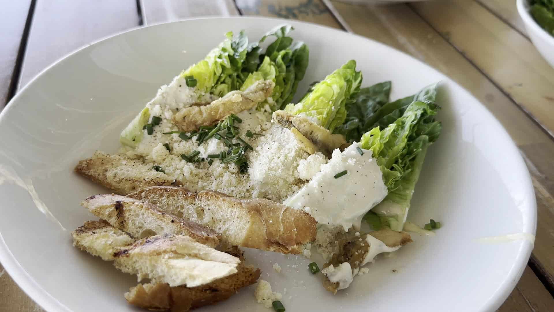 Caesar salad topped with crispy fried oysters at Pier 6 in San Leon, Texas