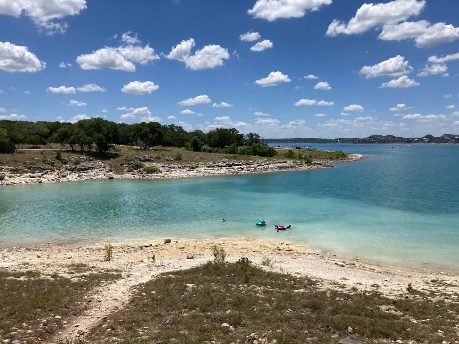 Turquoise clear water in a cove at Canyon Lake, Texas