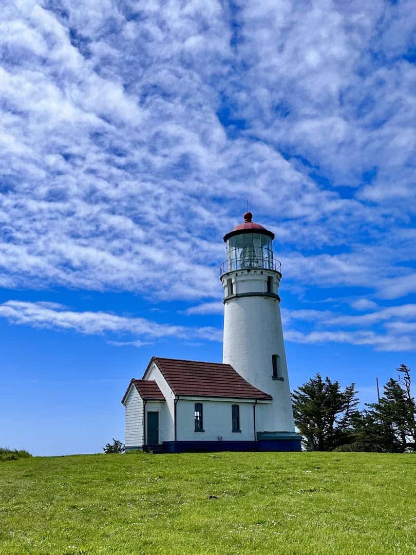 Cape Blanco Lighthouse standing white against a big sky near Port Orford, Oregon