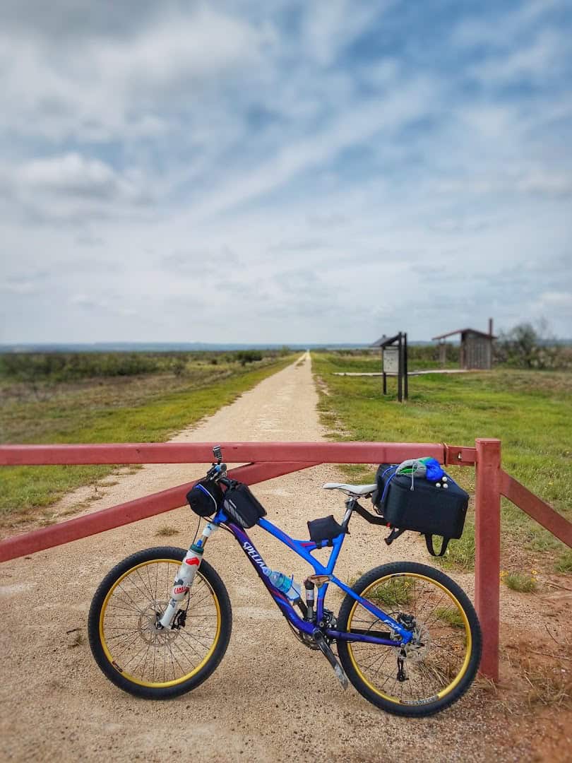A mountain bike at a trail gate on the Caprock Canyons Trailway, Texas