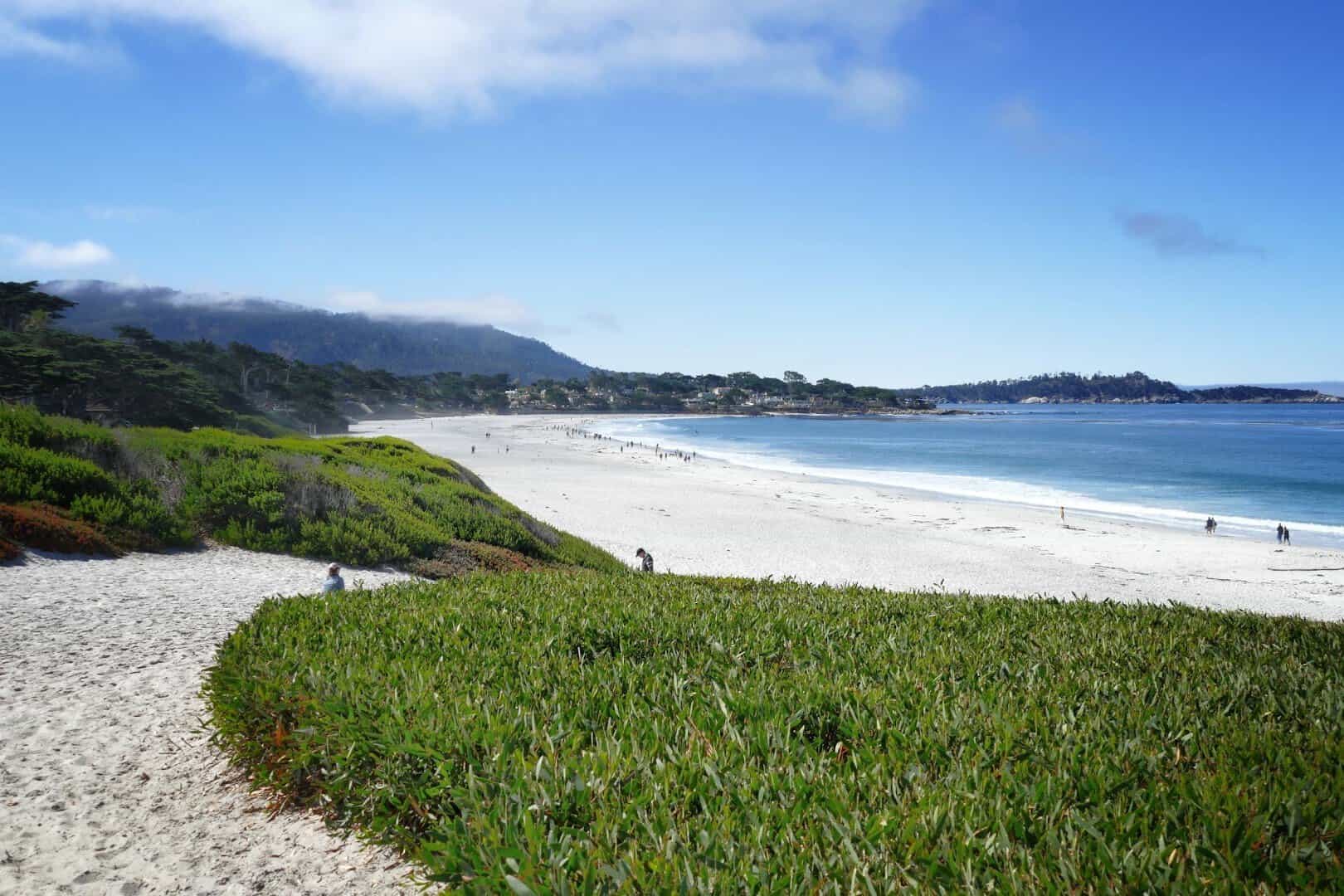 White sand crescent of Carmel Beach in Carmel-by-the-Sea, California
