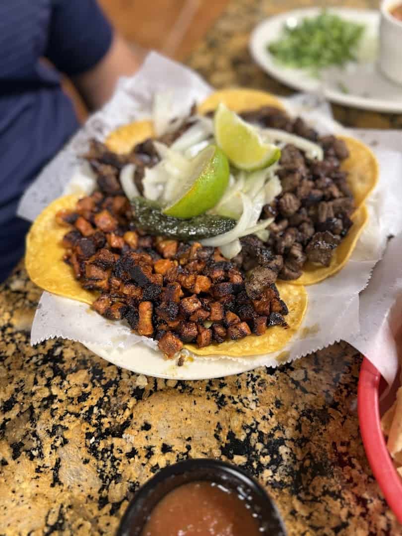 Carne asada street tacos with lime and onion at Eddie's Taco House in San Antonio
