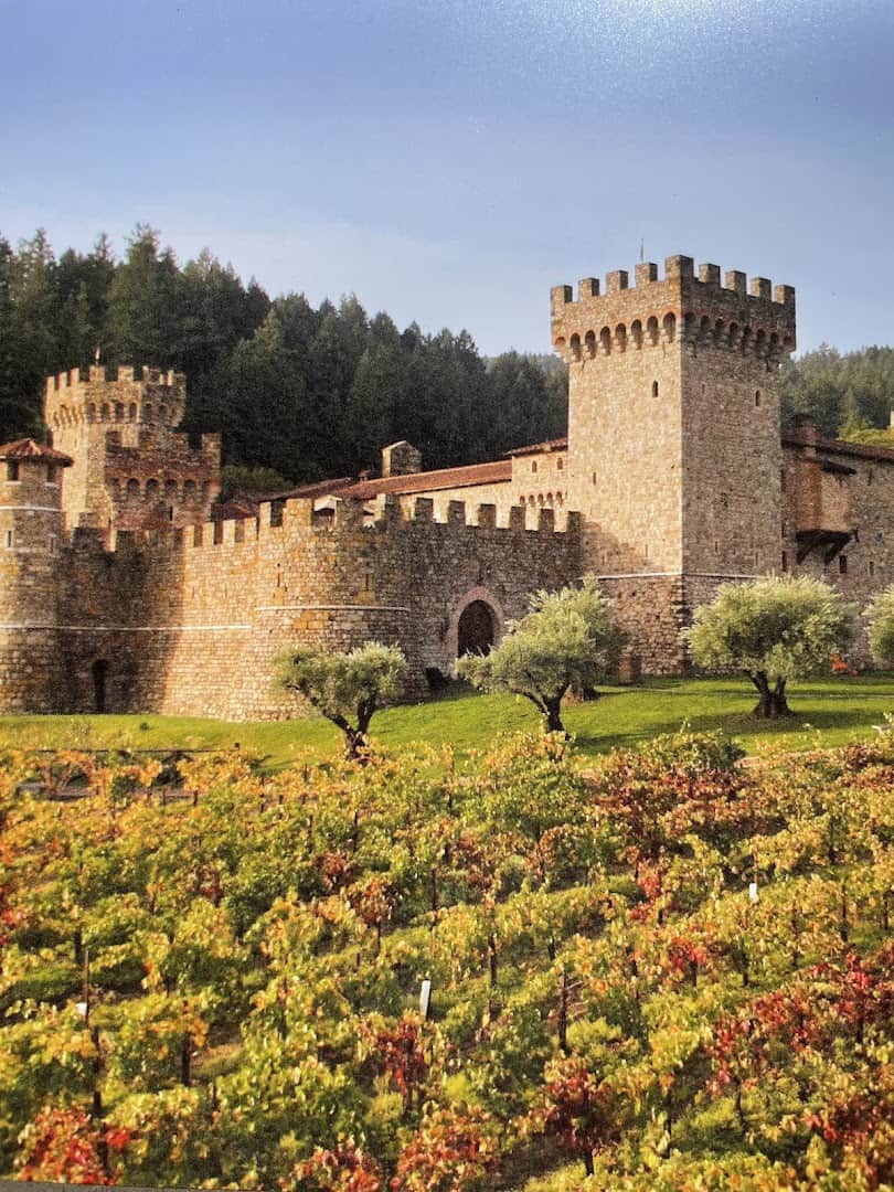 Castello di Amorosa castle winery above vineyards in Napa Valley, California