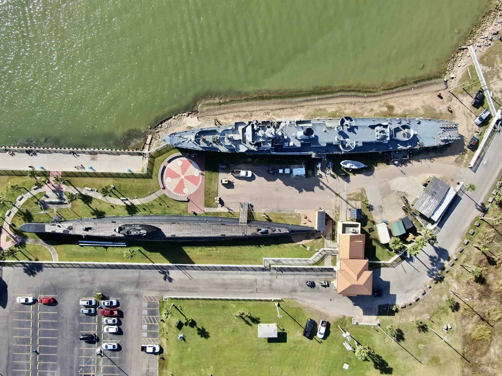 Aerial view of the USS Cavalla submarine and destroyer escort at Seawolf Park, Galveston