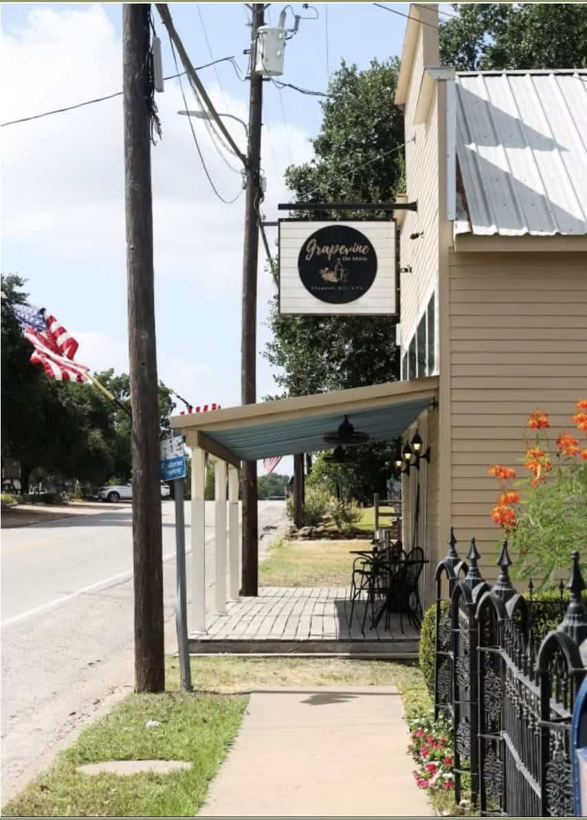 Storefront with a Chappell Hill sign in the historic downtown