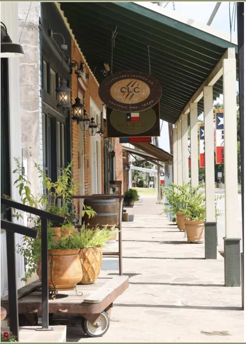 Covered porch and storefront on Main Street in historic Chappell Hill, Texas