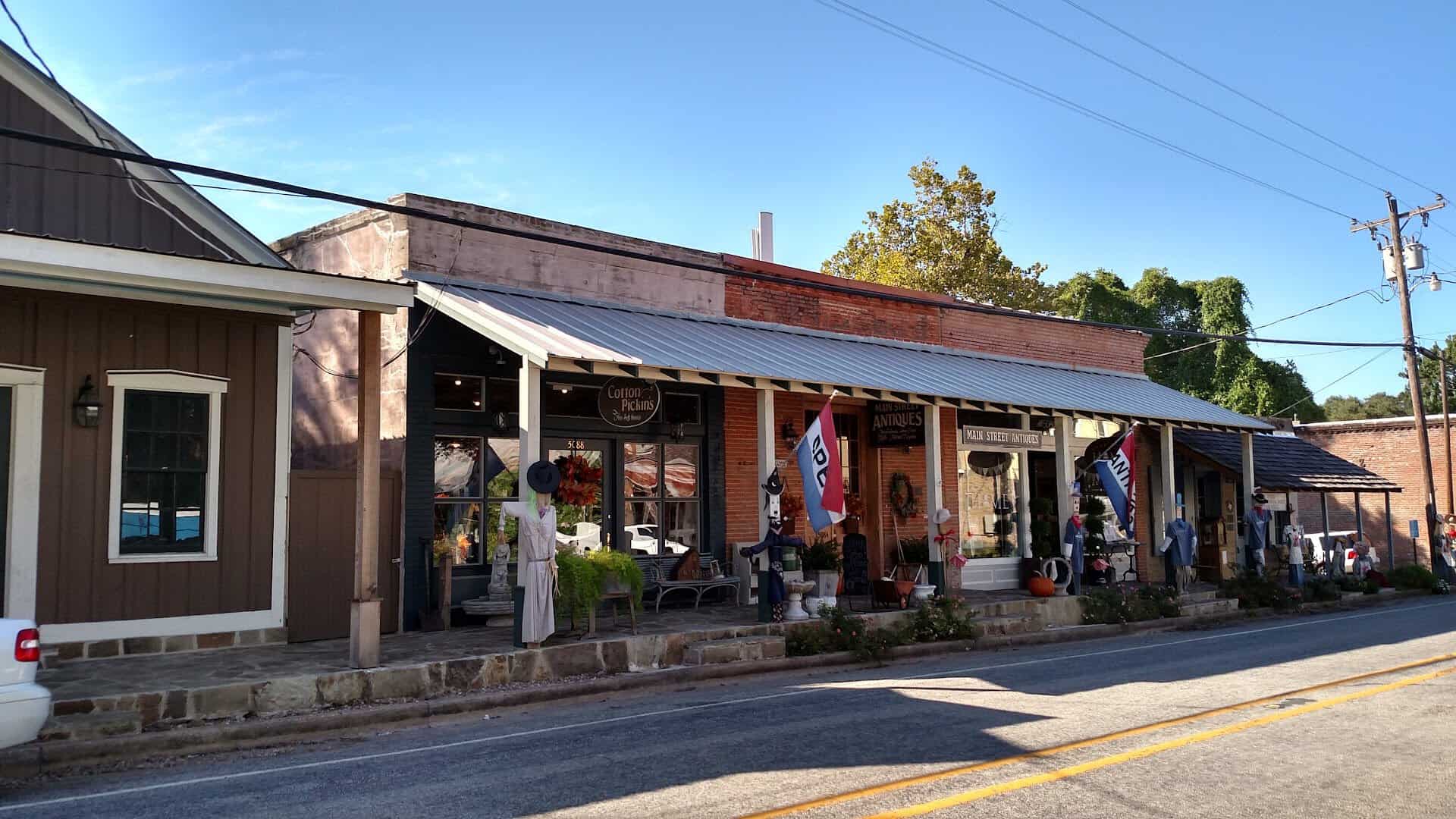 Historic brick storefronts along Main Street in Chappell Hill, Texas