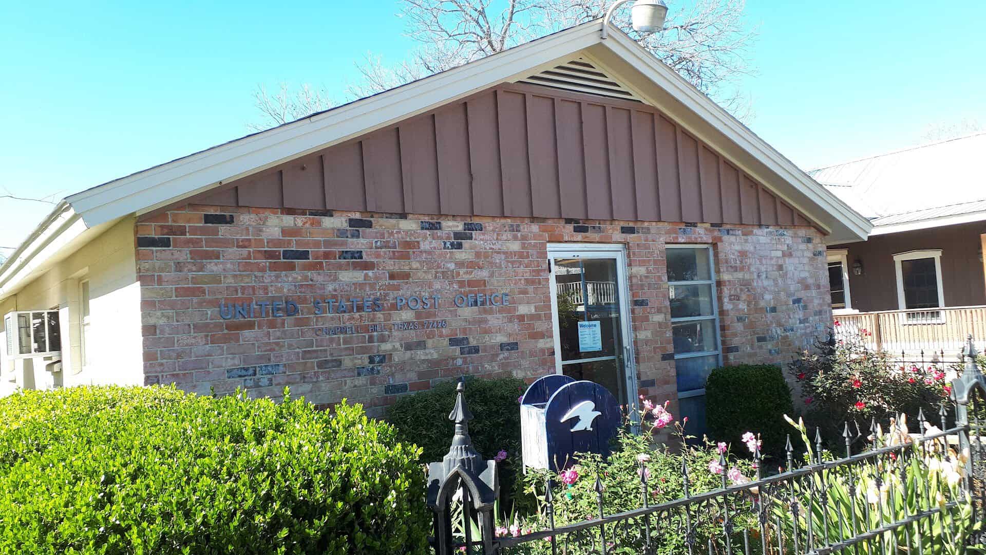 The brick United States Post Office building in Chappell Hill, Texas