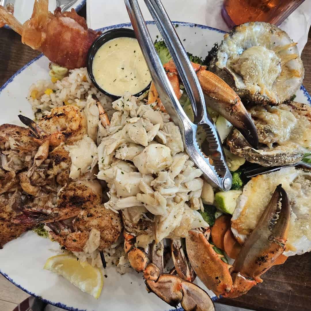 Chargrilled Gulf oysters and seafood platter at Katie's Seafood House in Galveston, Texas