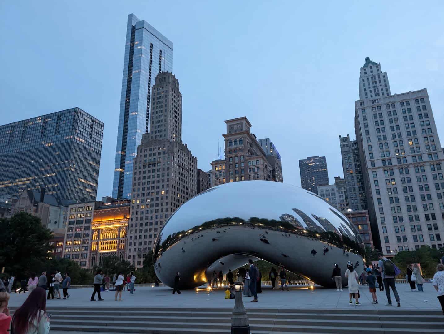Cloud Gate, the mirrored Bean sculpture, reflecting the Chicago skyline in Millennium Park, Illinois