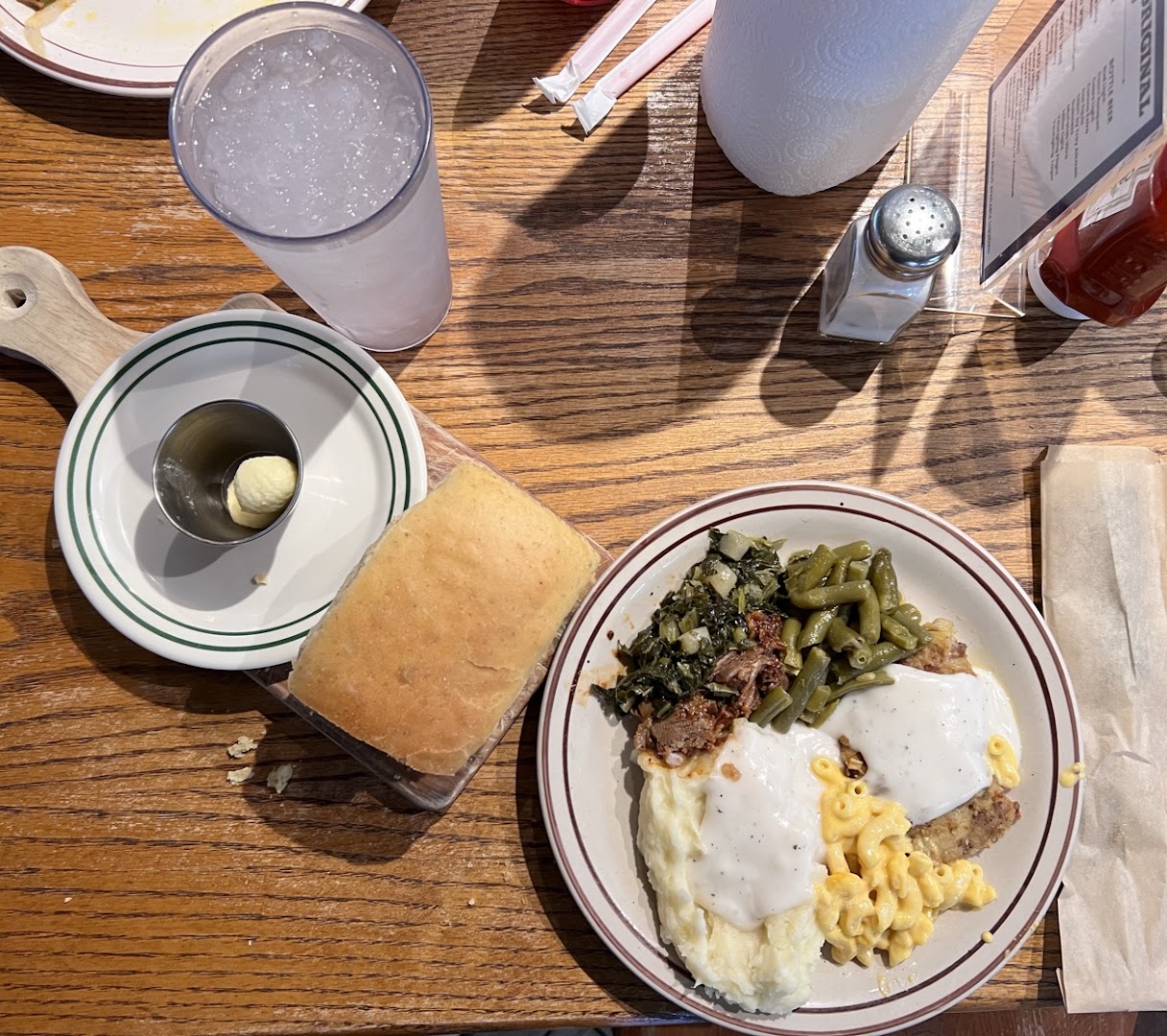 Chicken fried steak with cream gravy, mashed potatoes and sides at Sam's Original Restaurant in Fairfield, Texas
