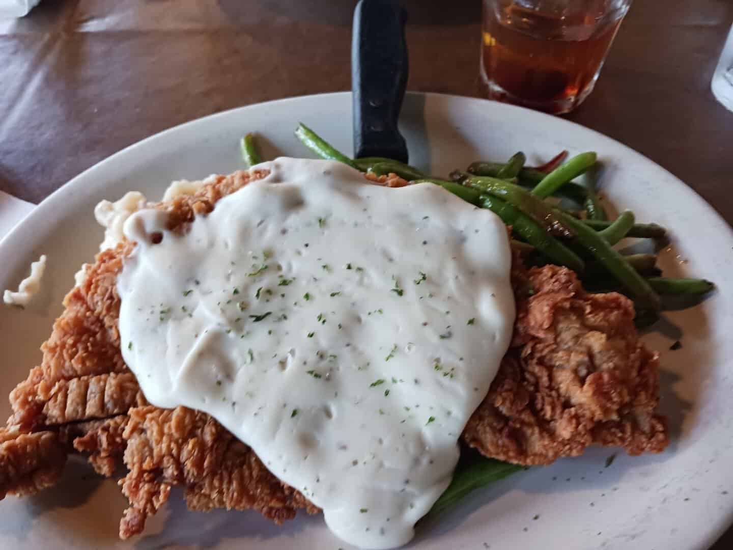 Chicken fried steak with cream gravy and green beans at Gruene River Grill in New Braunfels